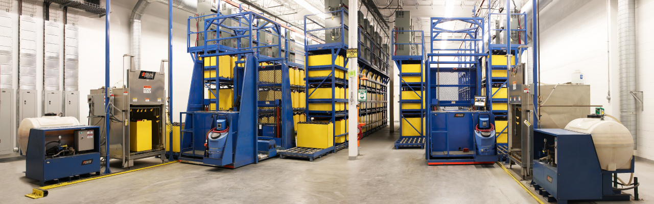 BHS forklift battery room operating two battery extractor systems